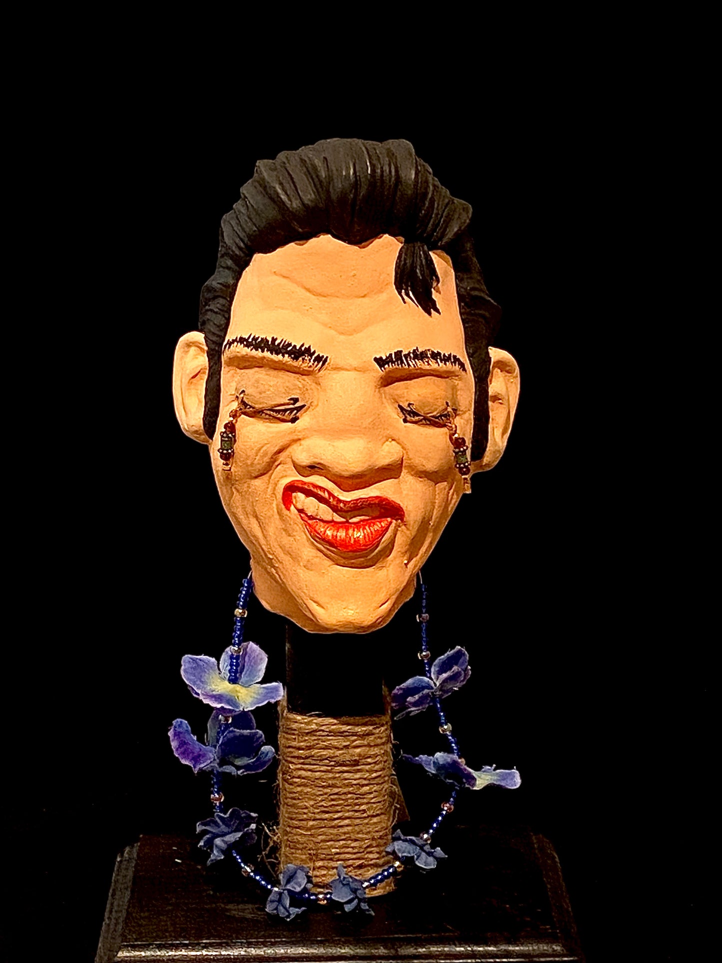 Shrunken Elvis Head Blue Lei