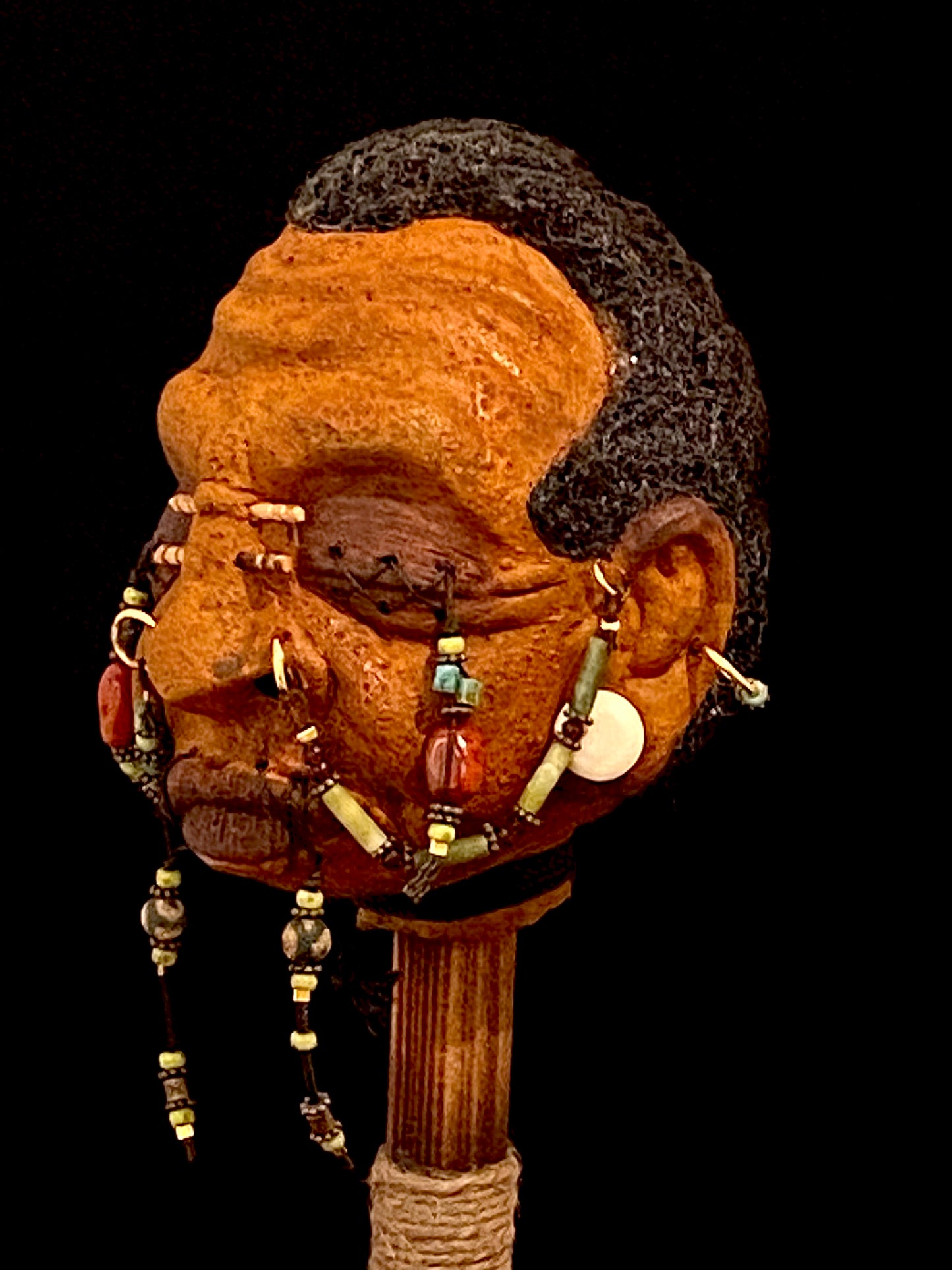 Shrunken Head Jade and Orange Beading