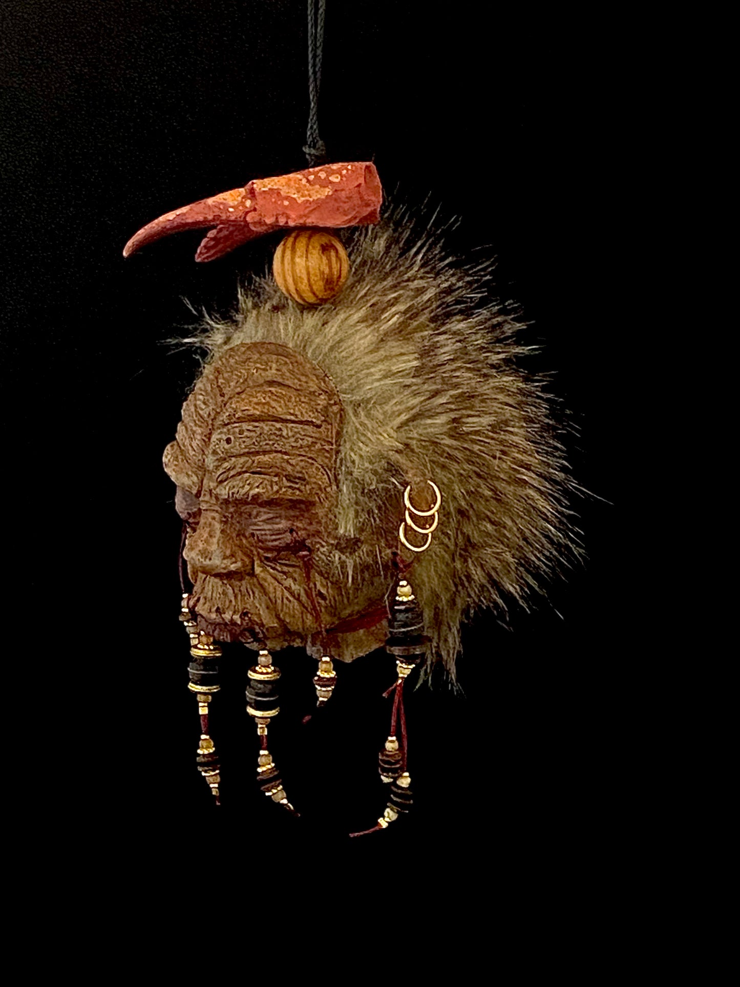 Medium Shrunken Head with Lobster Claw