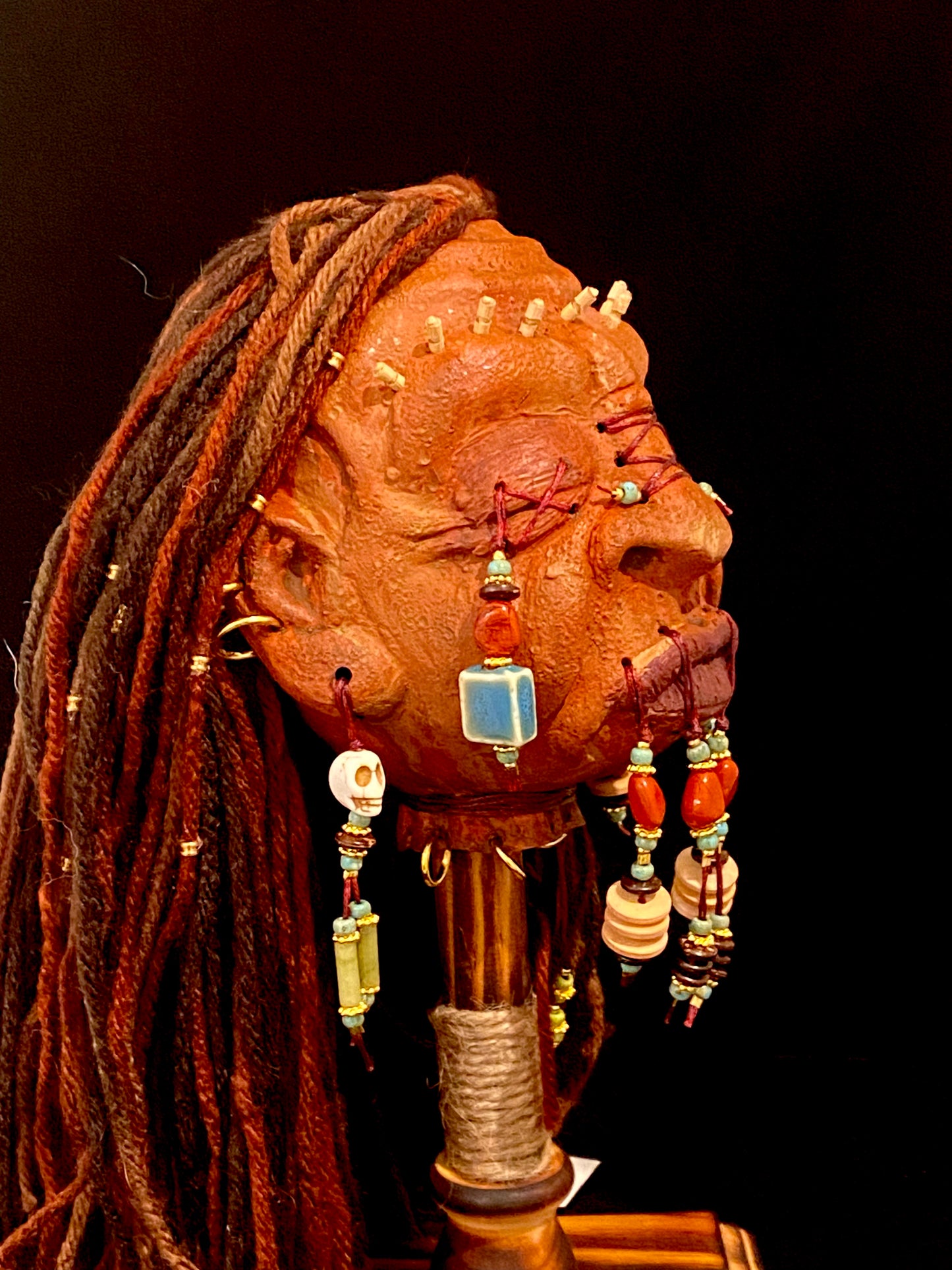 Shrunken Head Blue/Rust beading