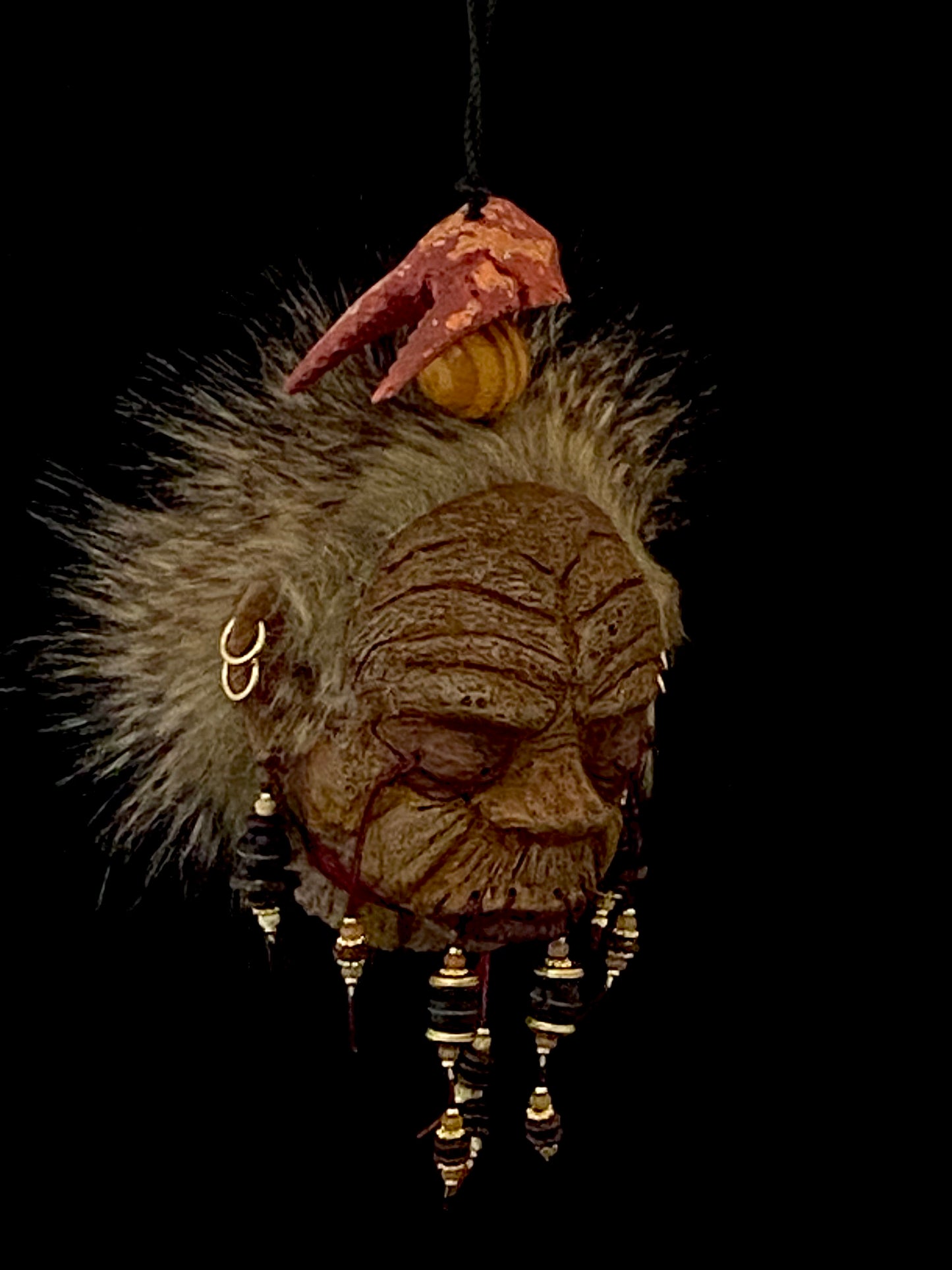 Medium Shrunken Head with Lobster Claw