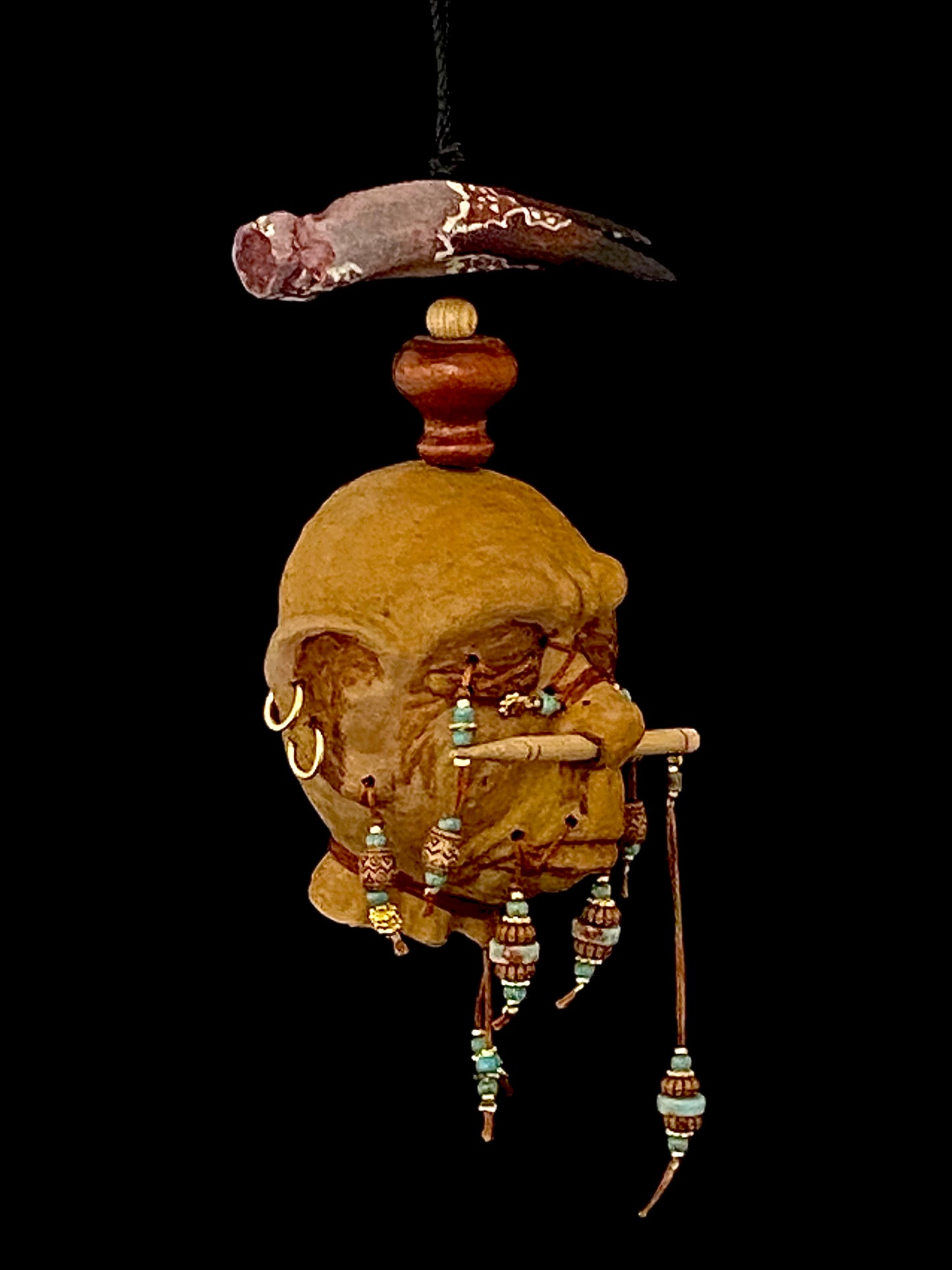 Small Hanging Shrunken Head with Lobster Claw